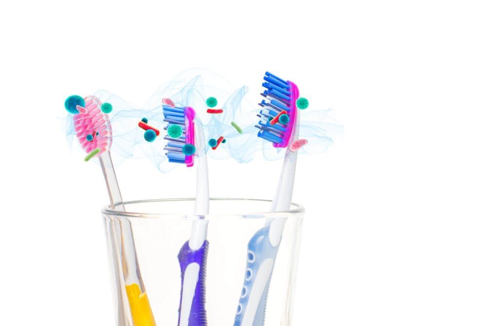 multiple toothbrushes in same cup